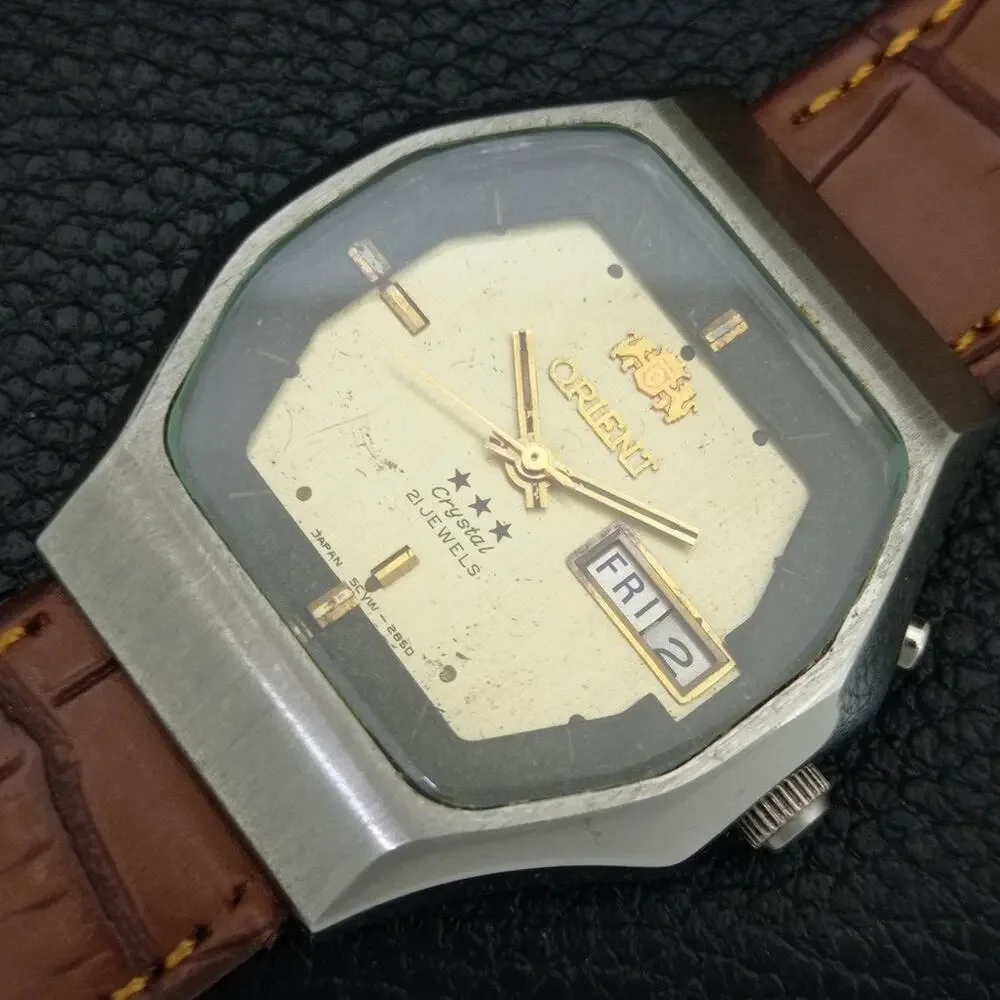 Vintage 1978 Orient Automatic Mens Silver Watch W/daydate & Gold accents